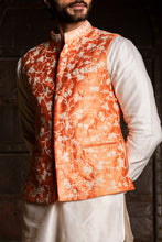 Load image into Gallery viewer, ORANGE RAW SILK EMBROIDERED NEHRU JACKET WITH KURTA AND PANT