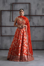 Load image into Gallery viewer, Orange embroidered bustier, banarsi lehenga and dupatta