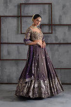 Load image into Gallery viewer, Purple tissue embroidered blouse, lehenga and dupatta