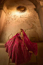 Load image into Gallery viewer, FUSCHIA RED RAW SILK BRIDAL LEHENGA CHOLI WITH A TULLE DUPATTA AND AN OPTIONAL SECOND TULLE DUPATTA