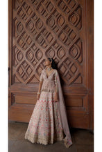 Load image into Gallery viewer, BLUSH PINK RAW SILK LEHENG WITH A PEPLUM TOP AND TULLE DUPATTA