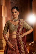 Load image into Gallery viewer, RUST TAFETTA LEHENGA WITH OLIVE CHOLI, MAROON TISSUE DUPATTA AND BELT