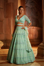 Load image into Gallery viewer, VIBRANT MINT GREEN TULLE LEHENGA CHOLI DUPATAA WITH A WORKED BELT