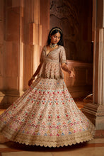 Load image into Gallery viewer, BLUSH PINK RAW SILK LEHENG WITH A PEPLUM TOP AND TULLE DUPATTA