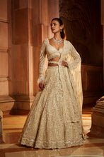 Load image into Gallery viewer, IVORY TULLE LEHENGA CHOLI DUPATTA SET WITH AN OPTIONAL VEIL