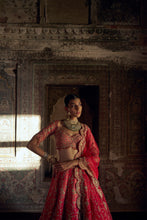 Load image into Gallery viewer, RED TO CORAL OMBRE DYED RAW SILK LEHENGA WITH A CORAL CHOLI AND RED DUPATTA AND A WORKED BELT.