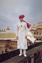 Load image into Gallery viewer, IVORY RAW SILK SHERWANI WITH A COTTON SILK CHOGA AND CHURIDAR AND OPTIONAL STOLE BELT AND WORKED JUTI