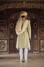 Load image into Gallery viewer, MINT GREEN RAW SILK SHERWANI WITH IVORY KURTA AND TROUSER WITH OPTIONAL WORKED STOLE BELT AND JUTIS.