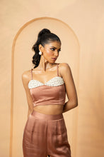 Load image into Gallery viewer, Intricate embelishment of pearls, cutdana, beads, and crystal stones on blouse and side of the pant.