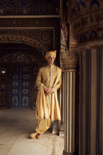 Load image into Gallery viewer, GOLD RAW SILK SHORT SHERWANI WITH A SATIN KURTA AND DHOTI WITH AN OPTIONAL WORKED STOLE AND JUTIS