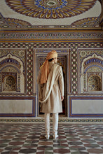 Load image into Gallery viewer, MUSHROOM RAW SILK SHERWANI WITH A COTTON SILK KURTA AND CHURIDAR AND OPTIONAL STOLE BELT AND WORKED JUTIS.