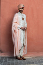 Load image into Gallery viewer, IVORY RAW SILK EMBROIDERED SHERWANI WITH MONGA TASSAR SILK KURTA AND CHURIDAR