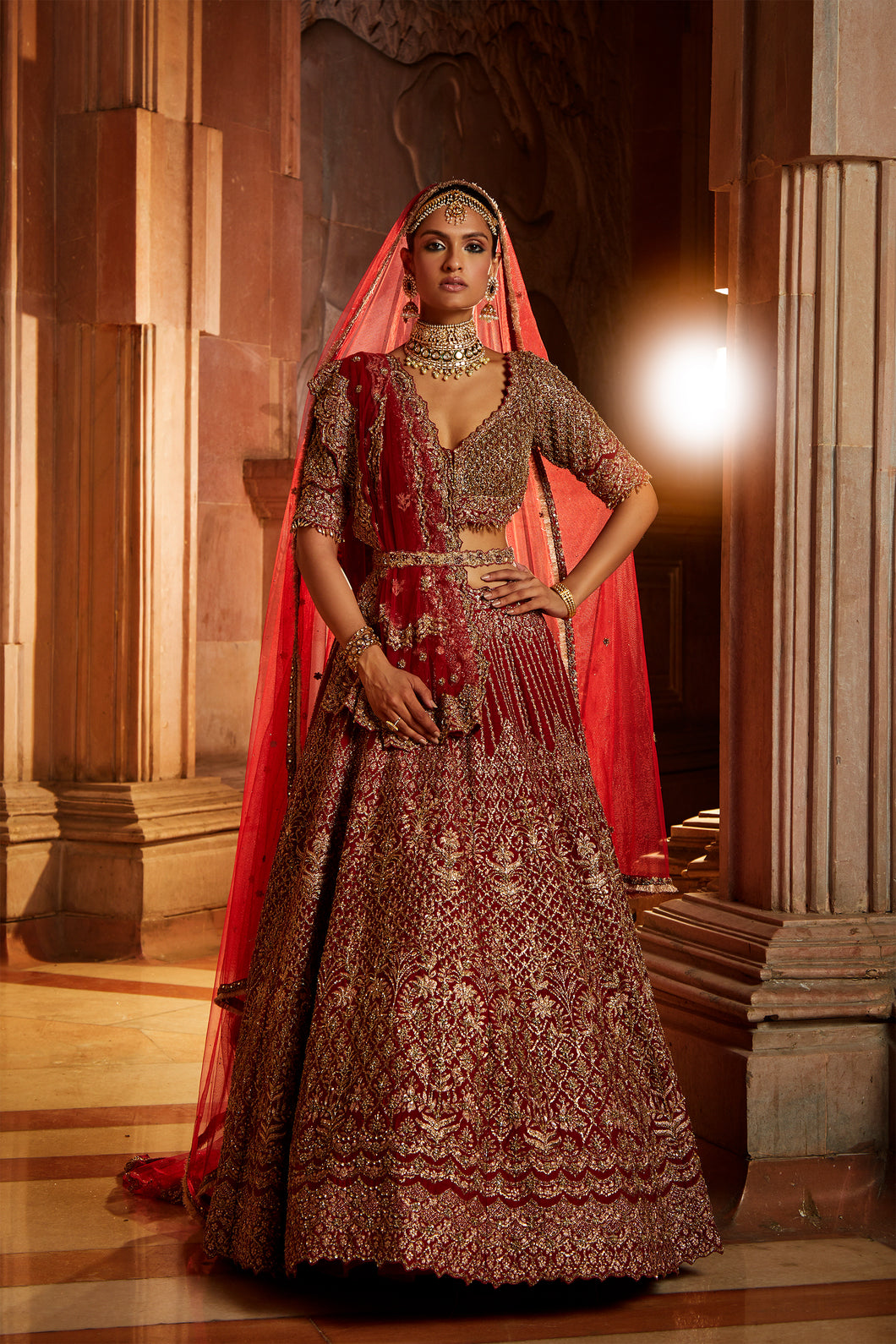 BLOOD RED RAW SILK LEHENGA CHOLI AND BELT WITH TULLE DUPATTA WITH AN OPTIONAL LIGHTER SECOND DUPATTA