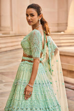 Load image into Gallery viewer, VIBRANT MINT GREEN TULLE LEHENGA CHOLI DUPATAA WITH A WORKED BELT
