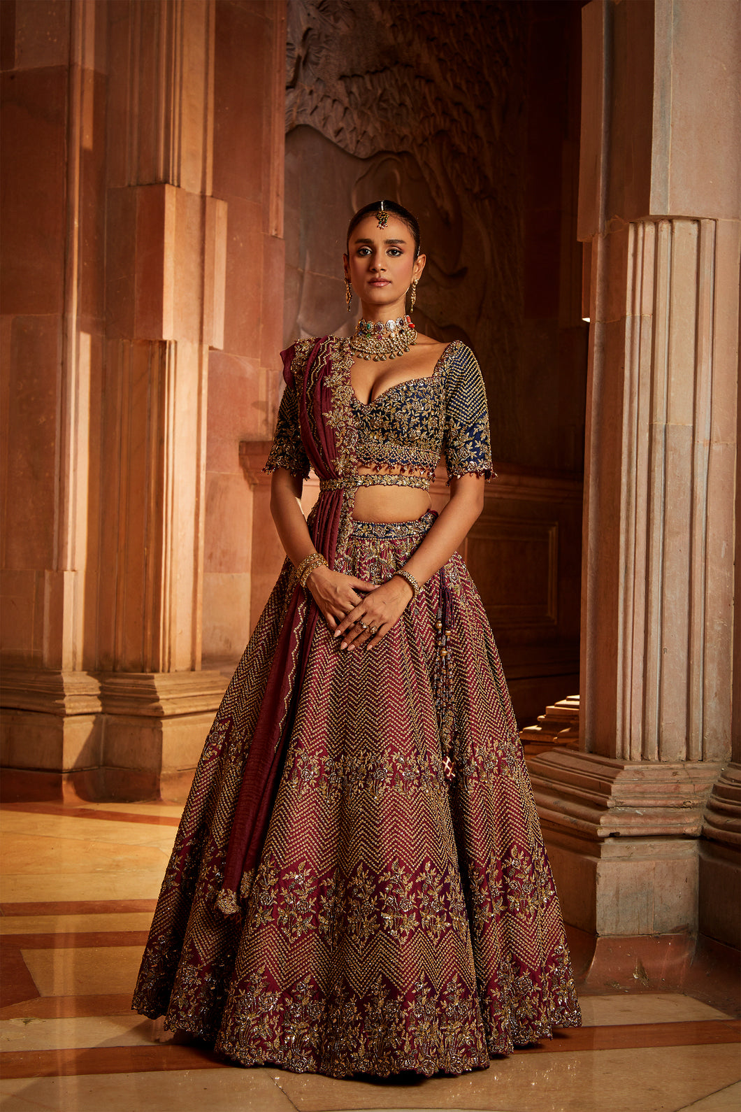 WINE TAFETTA LEHENGA AND BELT WITH NAVY CHOLI AND WINE TISSUE DUPATTA