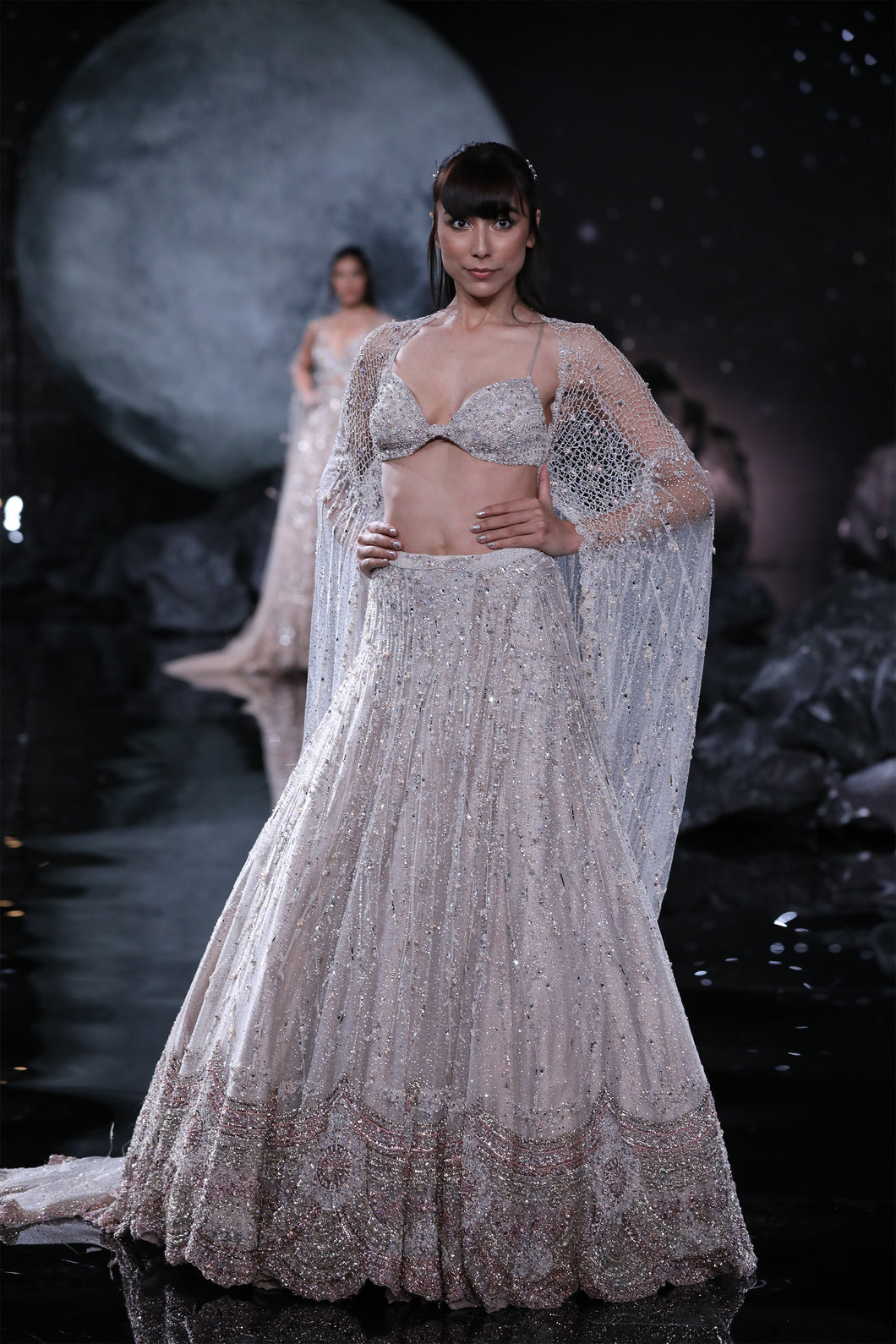 Paired with pearl and mukaish bralet choli and  Embroidered shimmer Tulle veil