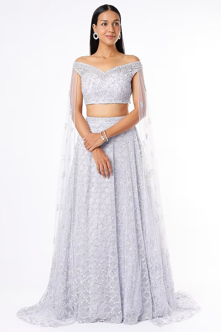 Lilac net cut dana, pearl and sequins embroidered lehenga