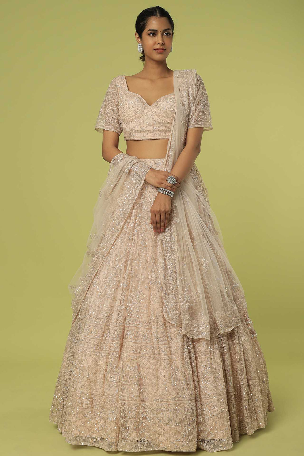 Peach net cut dana, pearl and sequins embroidered lehenga