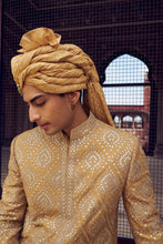 Load image into Gallery viewer, GOLD RAW SILK SHORT SHERWANI WITH A SATIN KURTA AND DHOTI WITH AN OPTIONAL WORKED STOLE AND JUTIS
