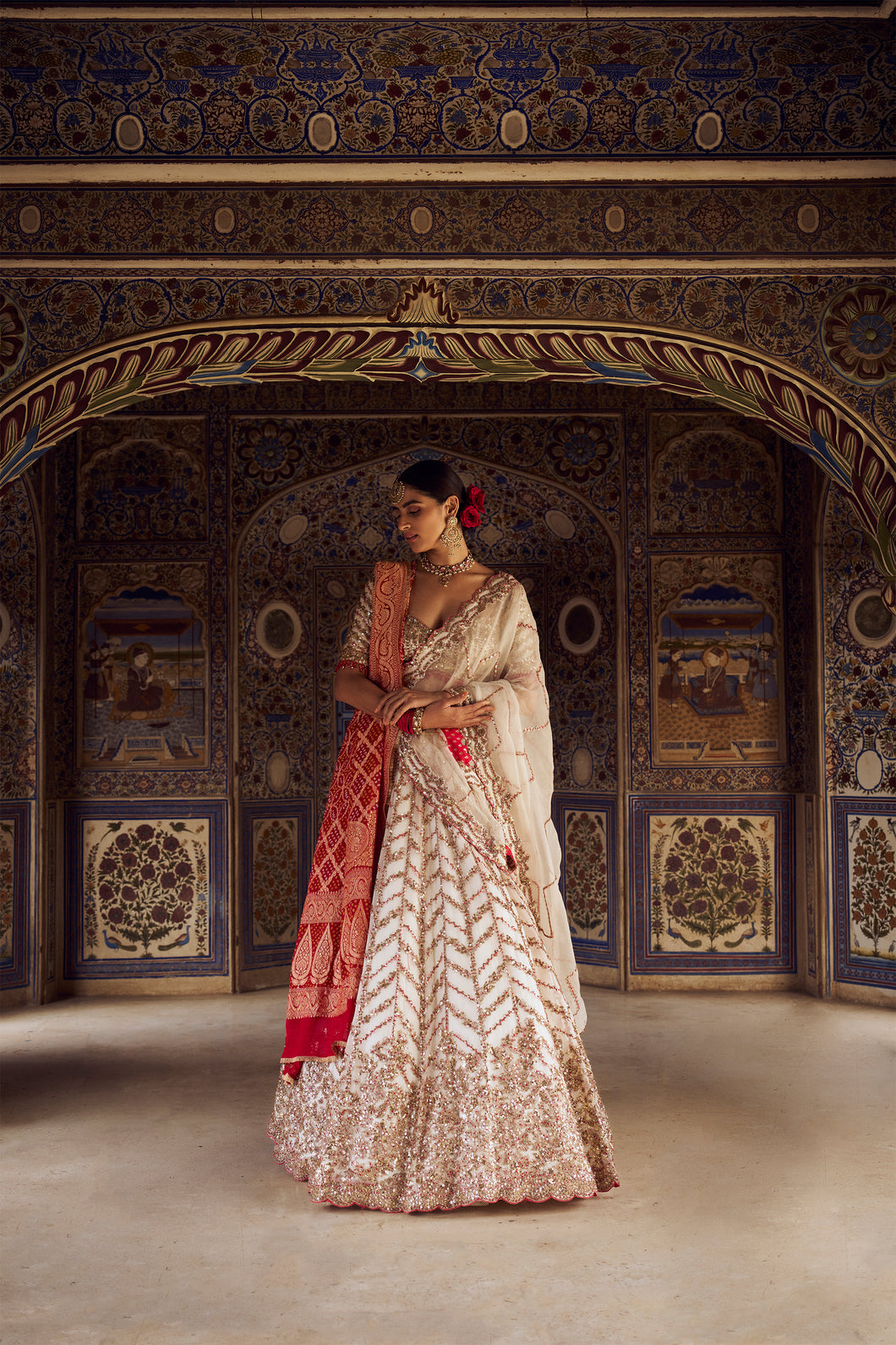 IVORY ORGANZA LEHENGA CHOLI DUPATTA SET WITH AN OPTIONAL SECOND RED  BANDHEJ DUPATTA