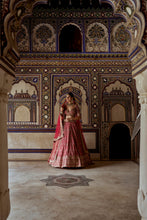 Load image into Gallery viewer, RED RAW SILK LEHENGA CHOLI WITH A NET DUPATTA AND AN OPTIONAL SECOND TISSUE  DUPATTA  WHICH CAN BE ORDERED SEPARATELY
