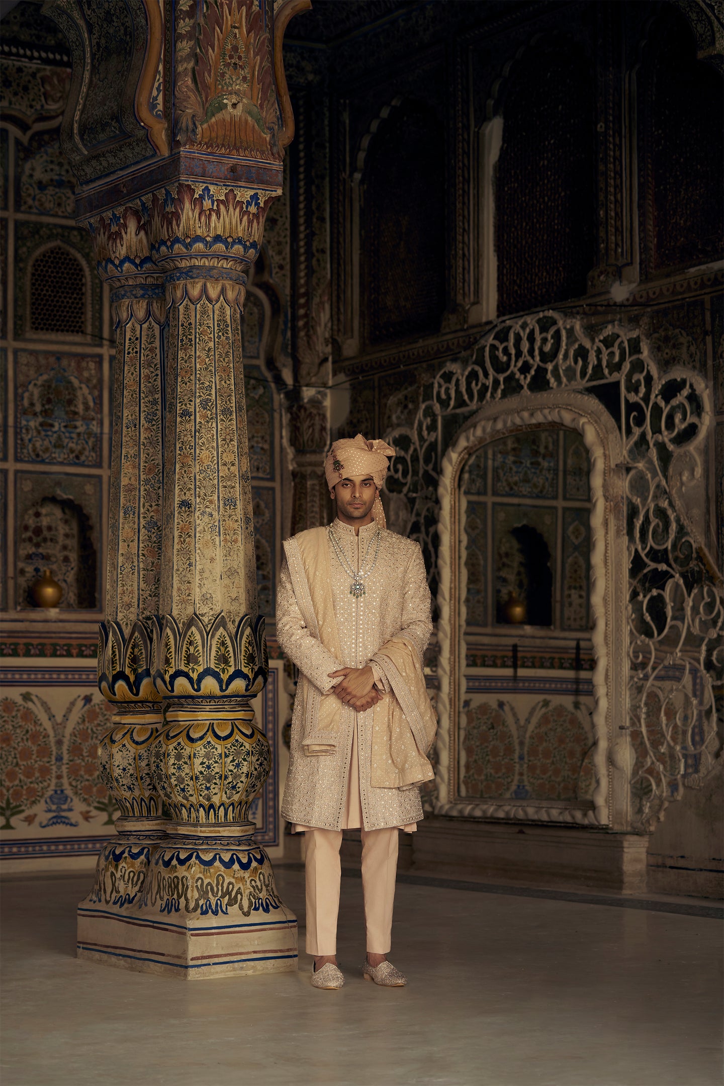 PEACH RAW SILK SHERWANI WITH KURTA AND TROUSER WITH AN OPTIONAL WORKED STOLE, BELT AND JUTIS