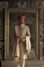 Load image into Gallery viewer, MOCCA RAW SILK SHERWANI WITH KURTA AND CHURIDAR. IT COMES WITH AN OPTIONAL WORKED STOLE, BELT AND JUTTIS
