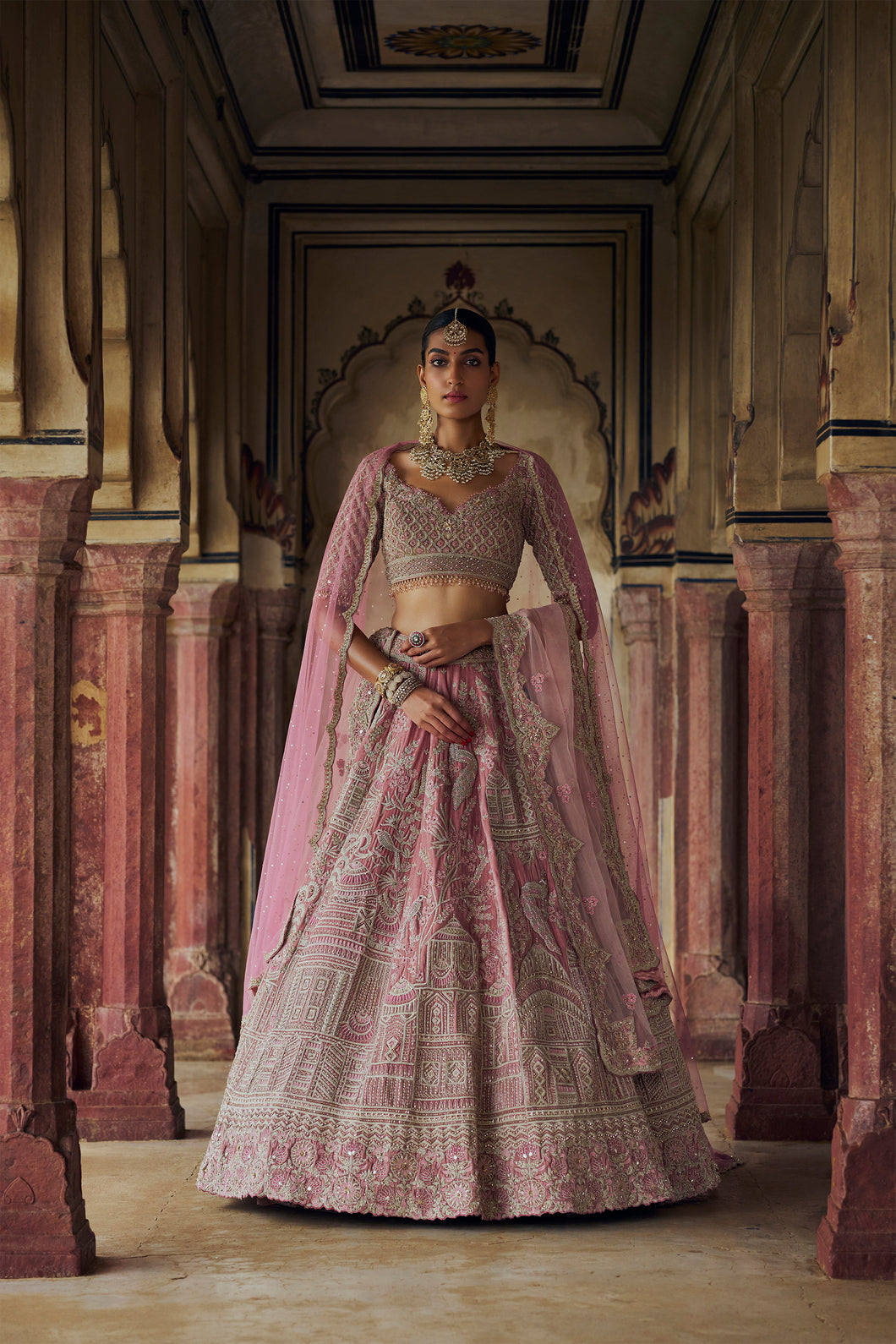 BLUSH PINK VELVET LEHENGA CHOLI WITH NET DUPATTA AND AN OPTIONAL WORKED BELT AND SECOND DUPATTA