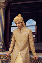 Load image into Gallery viewer, GOLD RAW SILK SHORT SHERWANI WITH A SATIN KURTA AND DHOTI WITH AN OPTIONAL WORKED STOLE AND JUTIS
