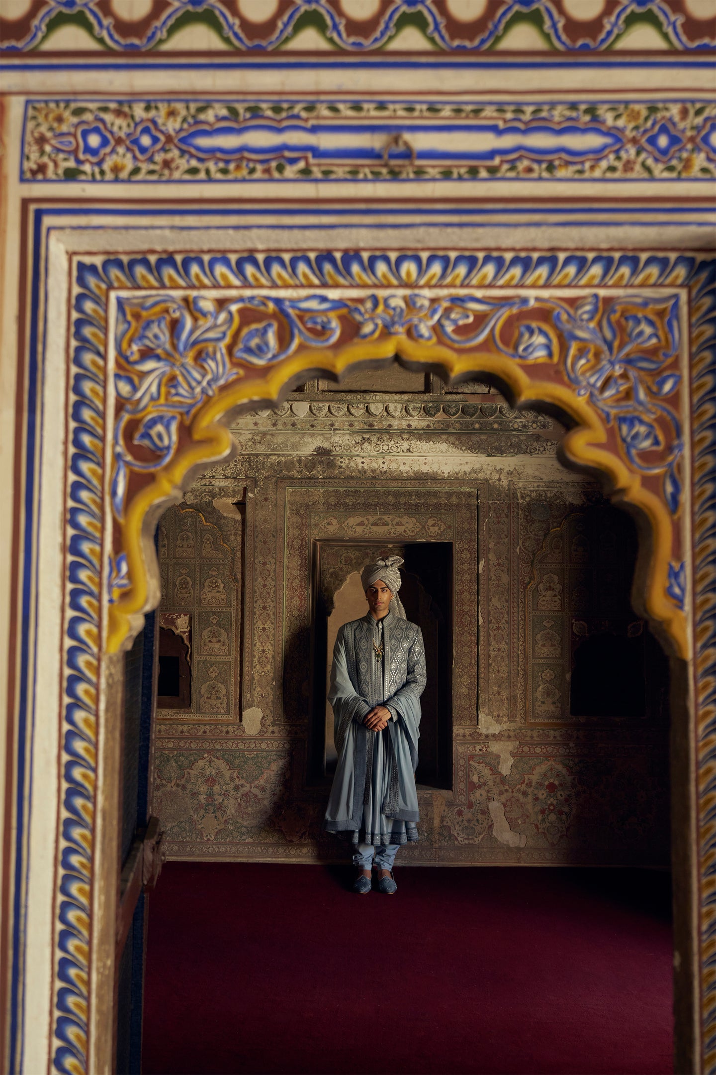 GREY RAW SILK OPEN SHERWANI WITH A CHOGA AND CHURIDAR AND AN OPTIONAL STOLE AND WORKED JUTIS