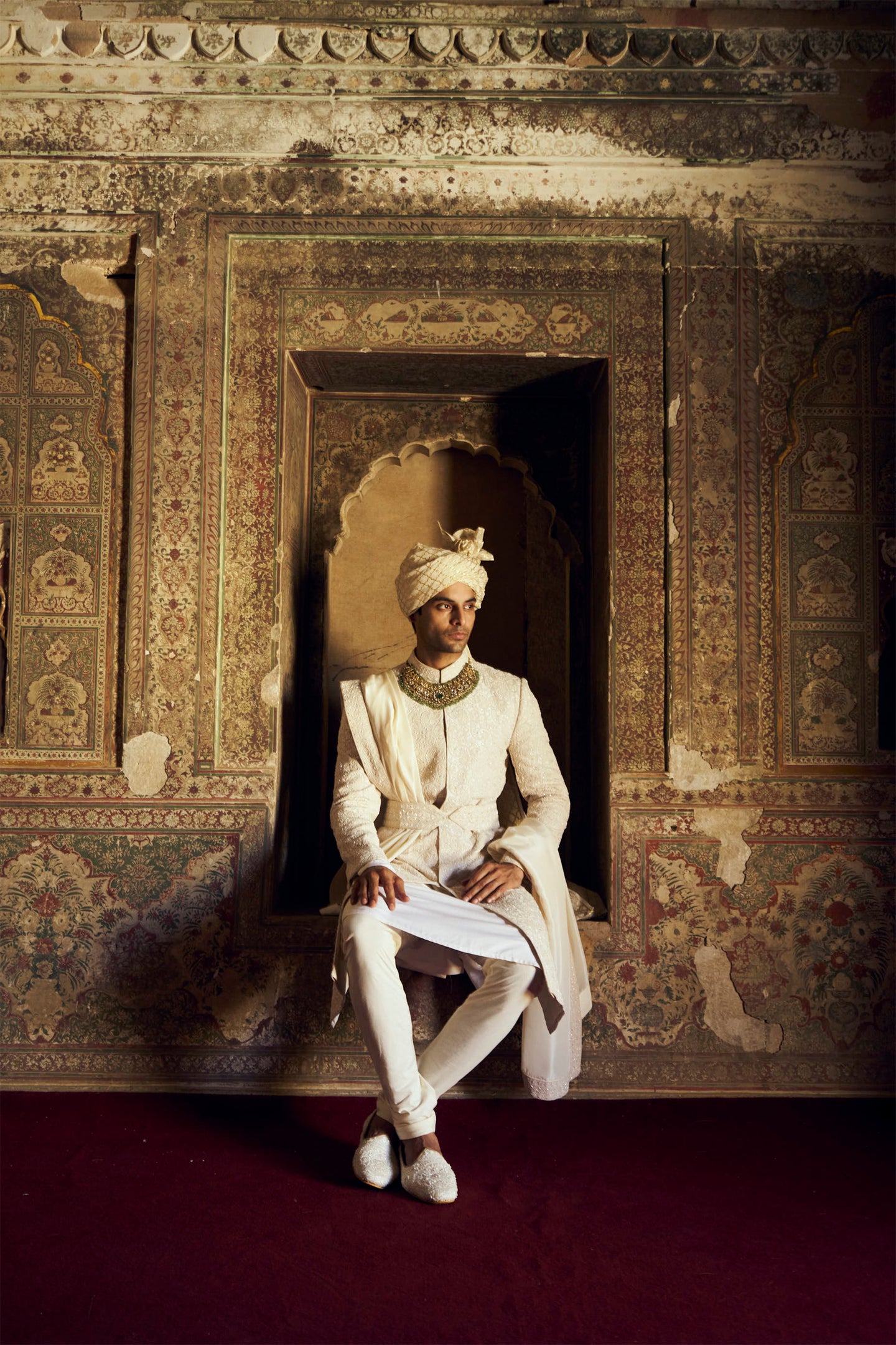 IVORY RAW SILK SHERWANI WITH KURTA AND CHURIDAR WITH AN OPTIONAL WORKED BELT, STOLE AND JUTIS