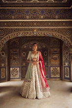 Load image into Gallery viewer, SILVER TISSUE LEHENGA CHOLI SET WITH AQUA NET DUPATTA AND AN OPTIONAL RED NET DUPATTA AND A HEAD VEIL WHICH CAN BE ORDERED SEPARATELY
