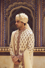 Load image into Gallery viewer, BEIGE RAW SILK SHERWANI WITH A COTTON SILK CHOGA AND CHURIDAR, WITH AN OPTIONAL STOLE AND JUTIS
