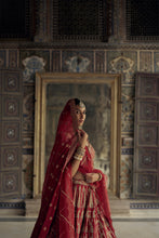 Load image into Gallery viewer, DEEP RED RAW SILK LEHENGA CHOLI SET WITH A TULLE DUPATTA AND AN OPTIONAL SECOND DUPATTA AND BELT.
