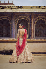 Load image into Gallery viewer, GOLD TISSUE LEHENGA CHOLI SET WITH RED DUPATTA AND AN OPTIONAL MINT GREEN DUPATTA, BELT AND GOLD HEAD VEIL .
