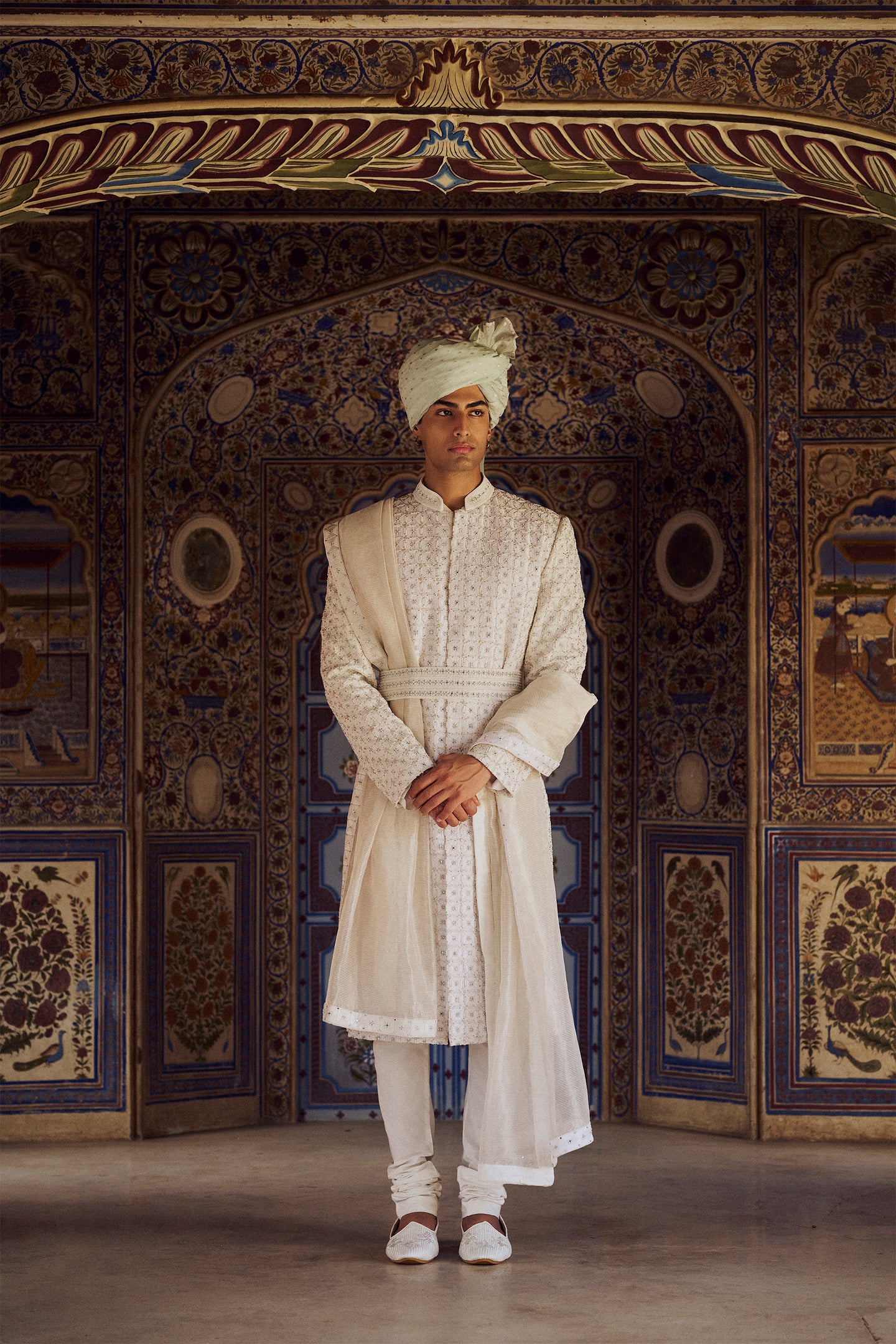 IVORY RAW SILK SHERWANI WITH KURTA CHURIDAR AND OPTIONAL STOLE BELT AND EMBROIDERED JUITS