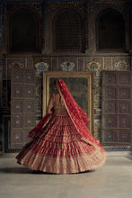 Load image into Gallery viewer, DEEP RED RAW SILK LEHENGA CHOLI SET WITH A TULLE DUPATTA AND AN OPTIONAL SECOND DUPATTA AND BELT.
