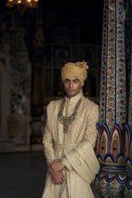 Load image into Gallery viewer, GOLD RAW SILK SHERWANI WITH KURTA AND CHURIDAR WITH AN OPTIONAL WORKED BELT, STOLE AND JUTIS.
