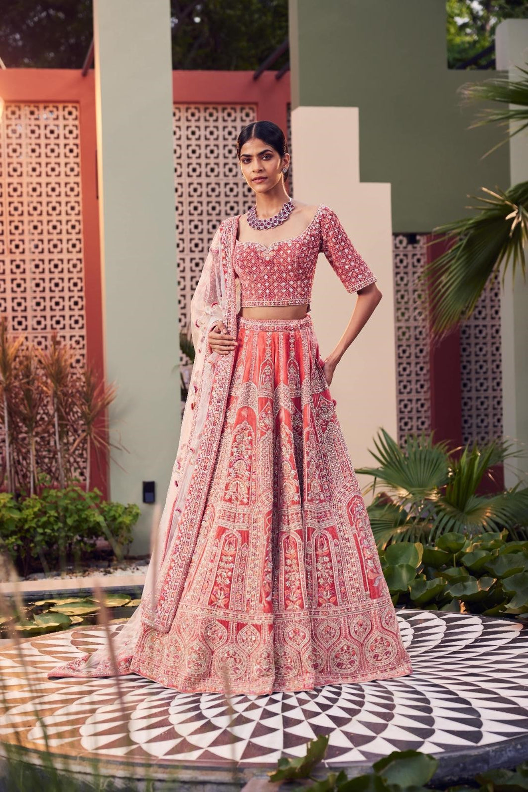 Coral velvet heavily embellished lehenga