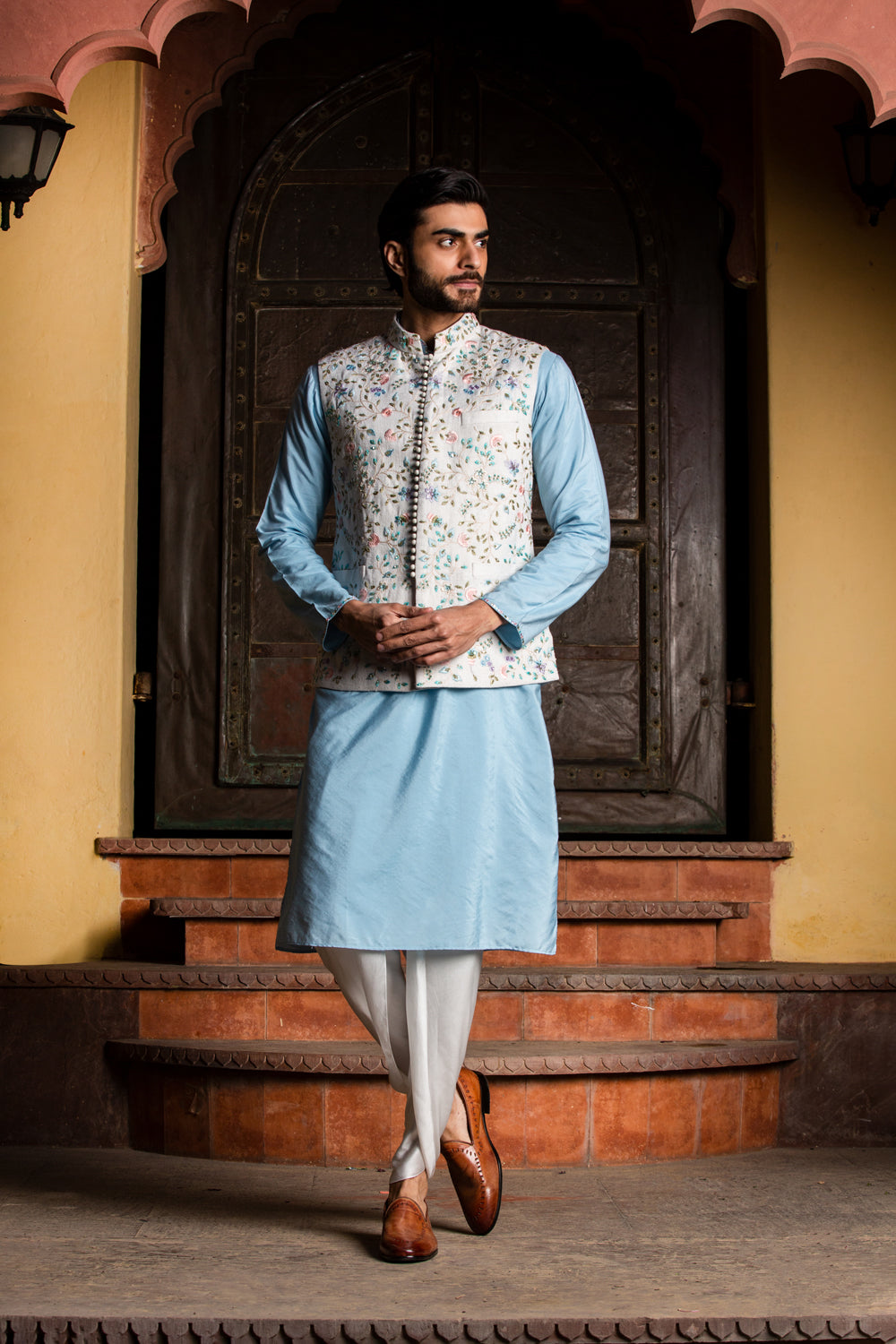 IVORY FLORAL MATKA JACKET WITH PODER BLUE KURTA AND IVORY DHOTI