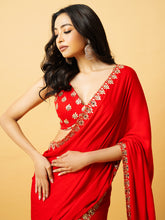 Load image into Gallery viewer, Red modal satin saree with hand embroidered sleeveless blouse
