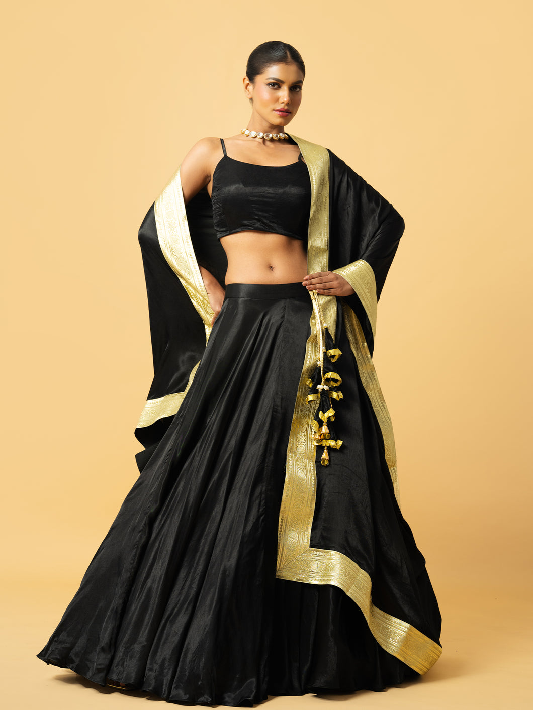 Black modal satin lehenga with golden lace in dupatta