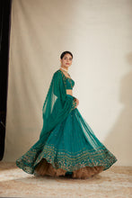 Load image into Gallery viewer, TEAL GREEN ANTIQUE SEQ WORK LEHENGA SET
